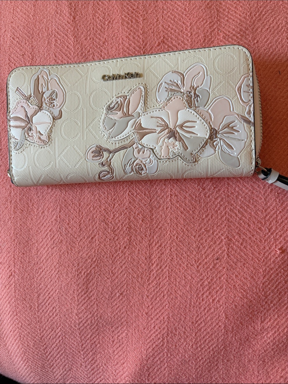 Calvin Klein Cream Zip-Around Wallet with Pink Floral Appliqués